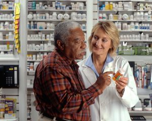 Man_consults_with_pharmacist_(1)