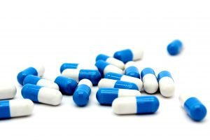 blue and white capsules