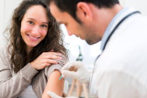 Woman receiving an injection
