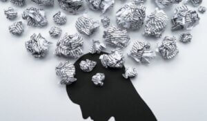 Mental health image. Silhouette of depressed and troubled person head.