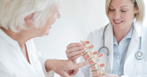 Doctor-explaining-bone-health-to-older-patient