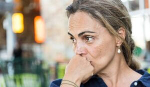 Concerned serious mature woman