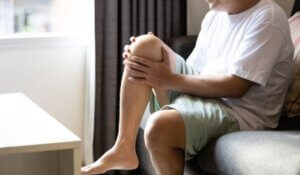Asian middle aged man suffer from Arthritis,