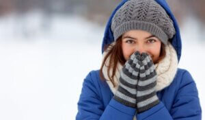 Women dressed in winter gear in snow