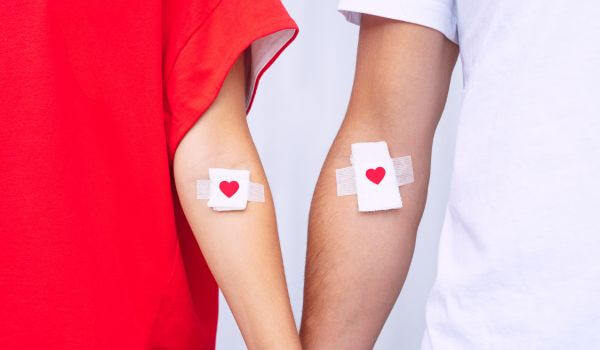 Blood donation. Blood donors with bandage after giving blood