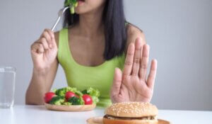 Woman Refusing to Eat Fast Food