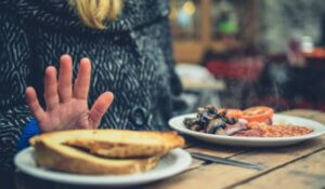 Woman on Gluten Free Diet Rejecting Toast