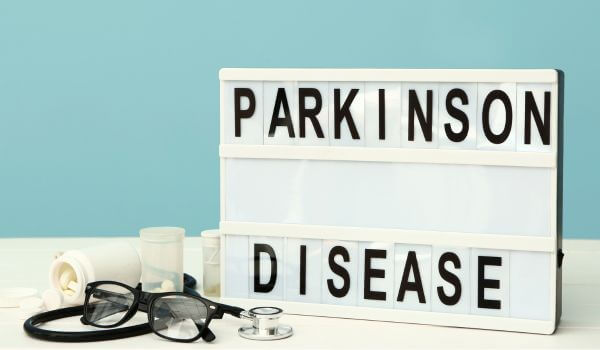 Board with Text PARKINSON'S DISEASE and Medicines